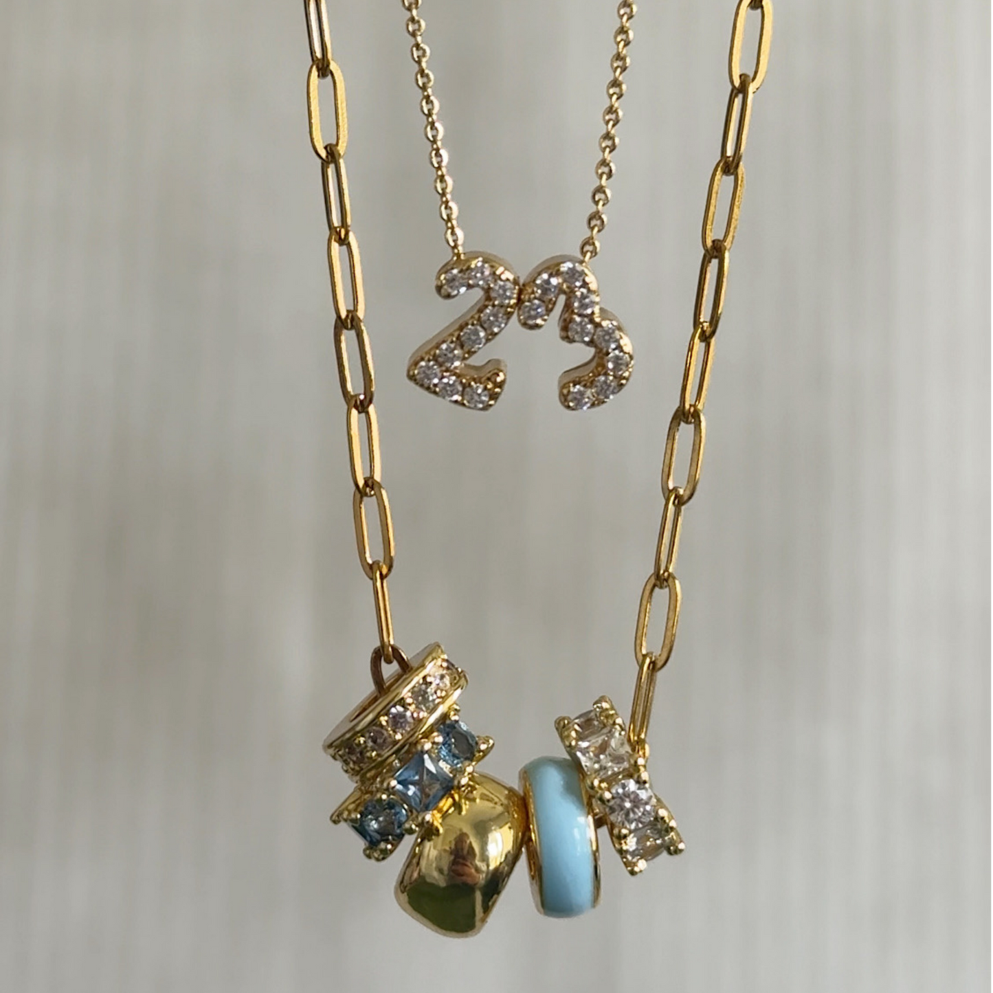Light Blue 5-Charm Slider Necklace in Gold