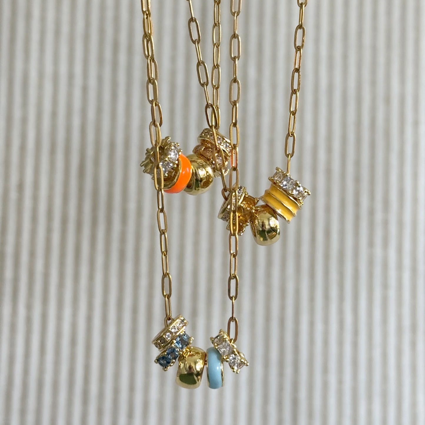 Light Blue 5-Charm Slider Necklace in Gold