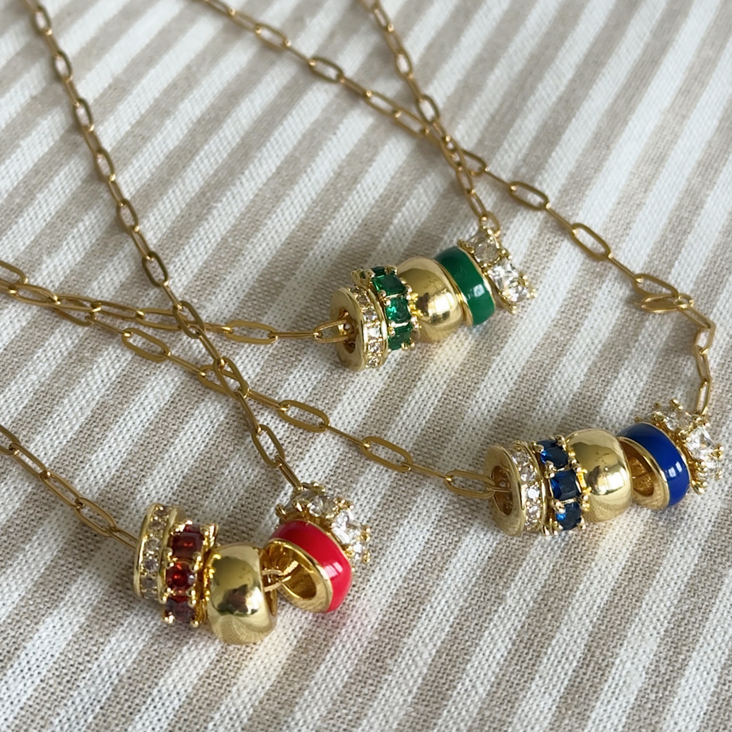Red 5-Charm Slider Necklace in Gold